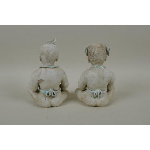 70 - A pair of Chinese song style figures of a boy and girl, 15cm high