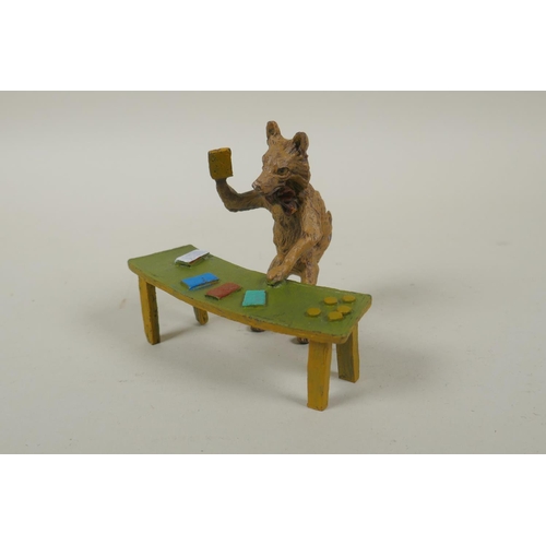 71 - An Austrian style cold painted bronze of a croupier fox, 9cm high