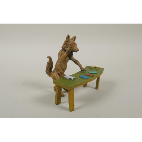 71 - An Austrian style cold painted bronze of a croupier fox, 9cm high