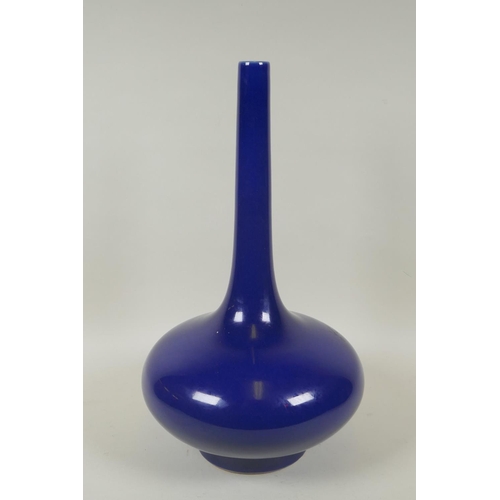 76 - A Chinese deep blue ground porcelain slender necked vase, KangXi 6 character mark to base, 39cm high