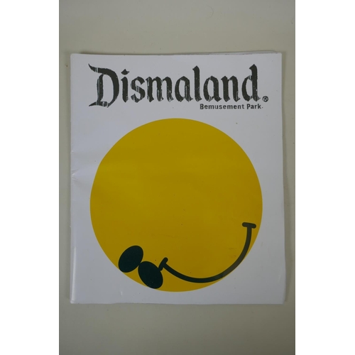 880 - After Banksy, a set of eight 'Save or Delete' stickers, and a Dismaland catalogue and flyer, 29 x 35... 