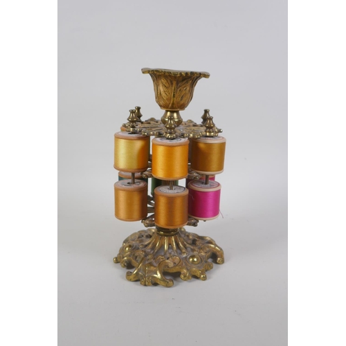 12 - A Victorian gilt brass two tier sewing spool holder, 20cm high