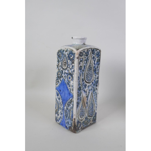 14 - An antique Persian blue and white glazed flask with boteh design, and another Perisan Iznik design p... 