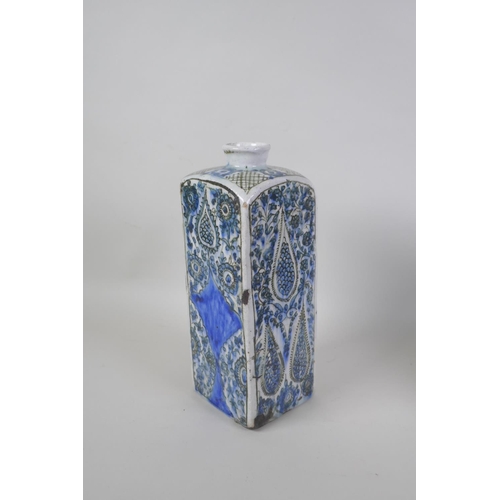 14 - An antique Persian blue and white glazed flask with boteh design, and another Perisan Iznik design p... 
