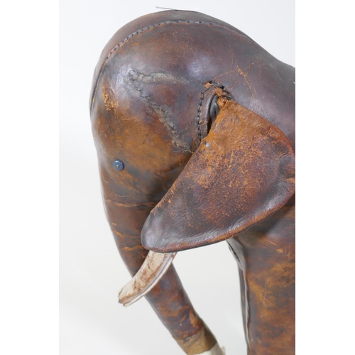 2 - Dimitri Omersa for Liberty & Co leather footstool in the form of an elephant, 56cm long, 45cm hi... 