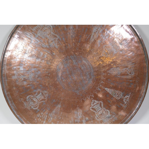 20 - A large C18th Ottoman copper tray, signed Master Al-Muhammad Al-Din Hesam Rezani, further inscribed ... 