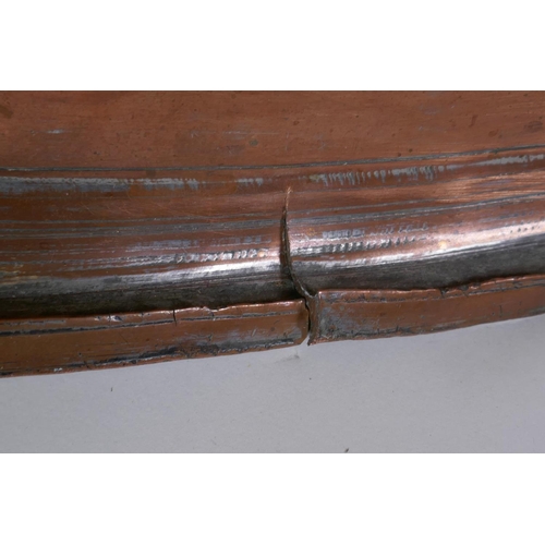20 - A large C18th Ottoman copper tray, signed Master Al-Muhammad Al-Din Hesam Rezani, further inscribed ... 