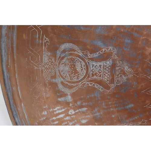 20 - A large C18th Ottoman copper tray, signed Master Al-Muhammad Al-Din Hesam Rezani, further inscribed ... 