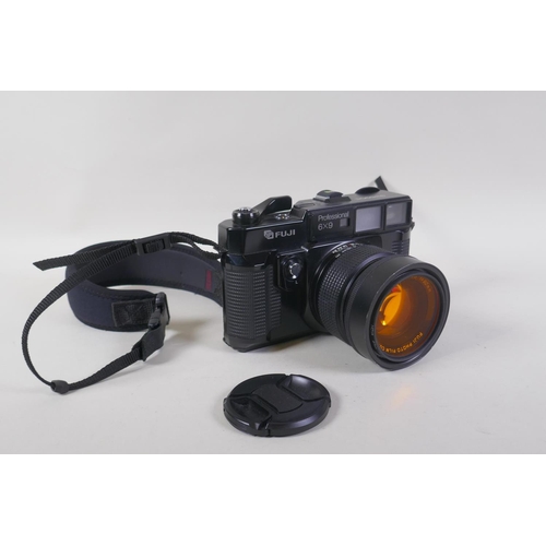 28 - A Fuji GW690II Professional 6 x 9 medium format rangefinder camera, fitted with an EBC Fujinon F/3.5...