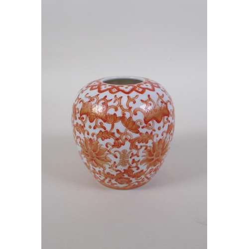 33 - A C19th Chinese porcelain pot with red and gilt auspicious symbol, bat and lotus flower decoration, ... 