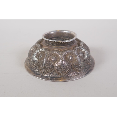 34 - A Chinese lotus shaped white metal ceremonial bowl, 4 character mark to base, 12cm diameter
