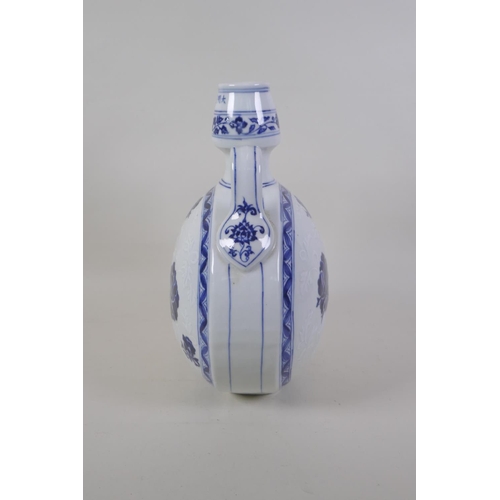 36 - A Chinese blue and white porcelain two handled moon flask with scrolling floral decoration, Xuande 6... 