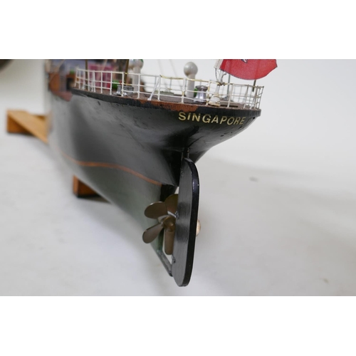 4 - A radio controlled model of a ship, steam coaster, Java Queen, 92cm long, 13cm beam