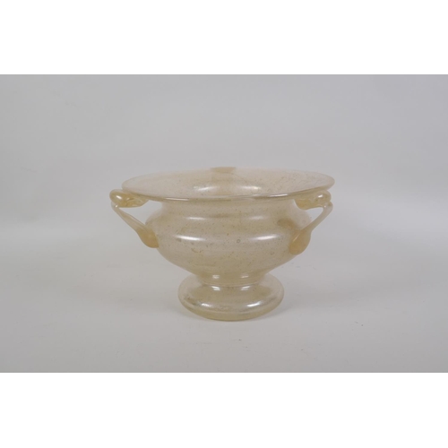 41 - A vintage art glass bottle vase, a hand blown two handled blue glass vase, and an iridescent art gla... 