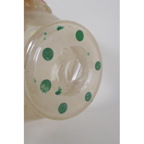 41 - A vintage art glass bottle vase, a hand blown two handled blue glass vase, and an iridescent art gla... 