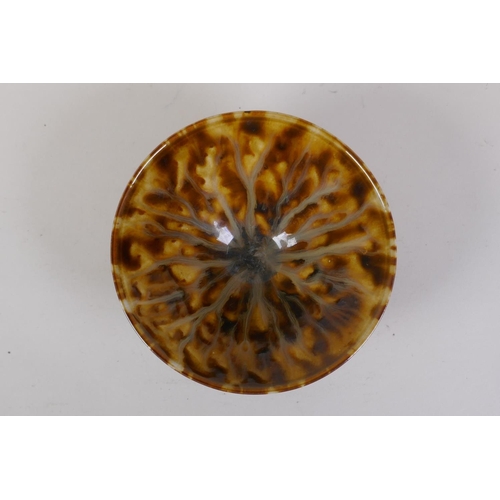 42 - A Chinese cizhou tortoise shell glazed conical bowl, 16cm diameter