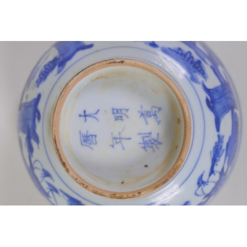 45 - A Chinese ming style blue and white porcelain bowl with the eight immortals, 6 character mark to bas... 