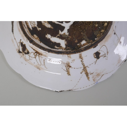 48 - A continental polychrome faience porcelain charger with lobed rim, decorated with an Iznik style des... 