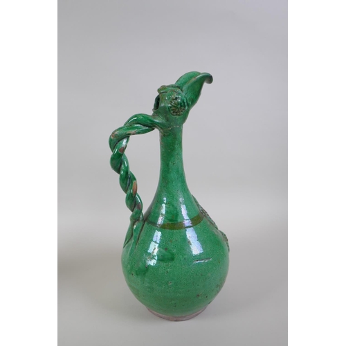 49 - An C19th Ottoman treacle glazed Canakkale pottery ewer with braided handle and applied floral decora... 