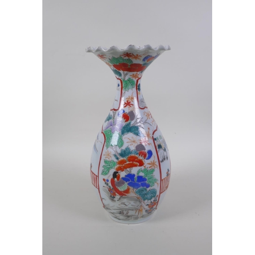 50 - A Japanese Meiji period Arita Imari porcelain vase, with decorative panels depicting a noble and gei... 