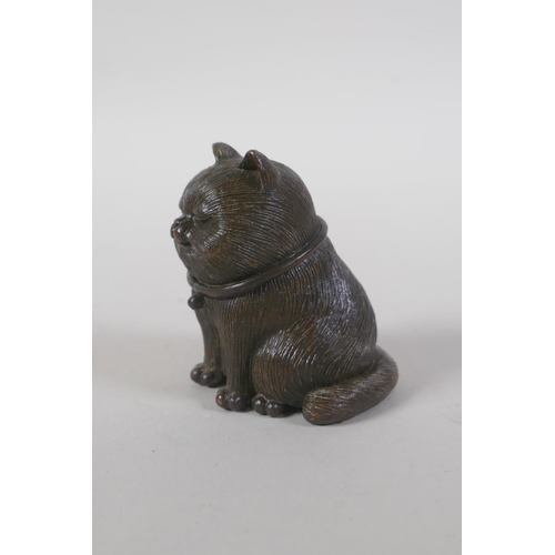 58 - A Chinese bronze cat, 16cm high