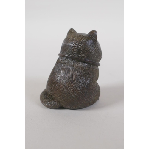 58 - A Chinese bronze cat, 16cm high