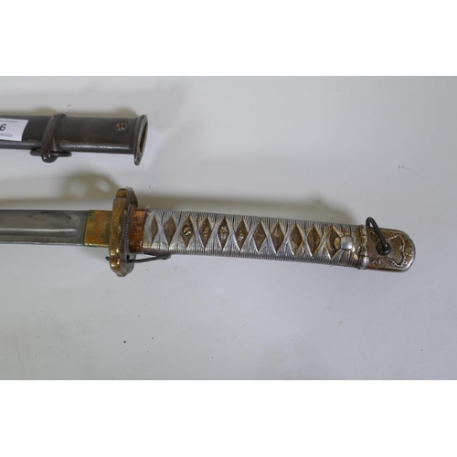 6 - A WWII Japanese Imperial Army NCO's Type 95 Shin Gunto sword, with aluminium hilt, showing traces of... 