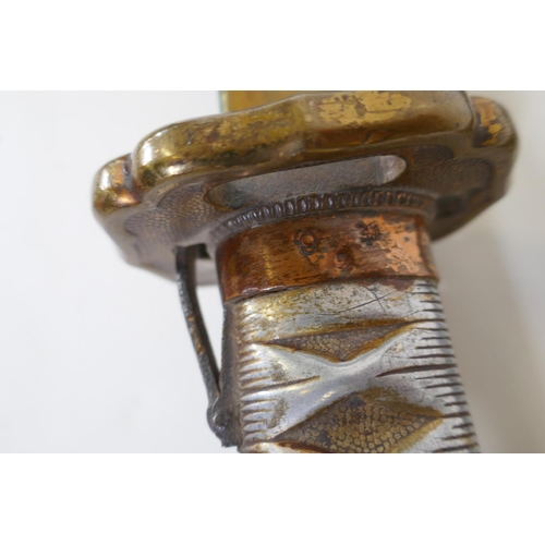 6 - A WWII Japanese Imperial Army NCO's Type 95 Shin Gunto sword, with aluminium hilt, showing traces of... 