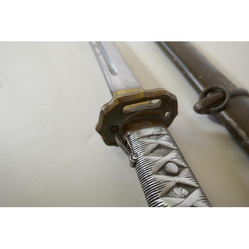 7 - A copy of a WWII Japanese Imperial Army NCO's Type 95 Shin Gunto sword, with aluminium hilt and bras... 