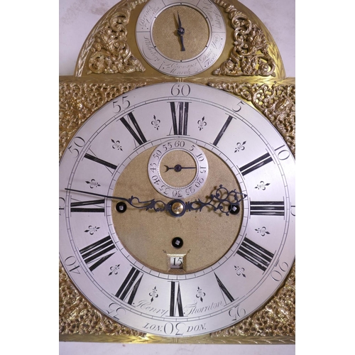 634 - A Queen Anne/George I mahogany musical longcase clock by Henry Thornton, the arched hood with three ... 