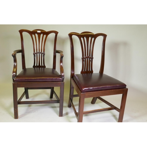 1003 - A good set of twelve (10+2) Georgian style mahogany dining chairs with pierced splat back and drop i...