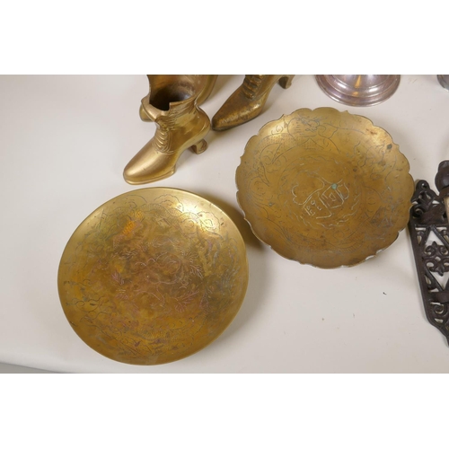 127 - A quantity of assorted metal wares including silver plated candlesticks, brass boots, silver plated ... 