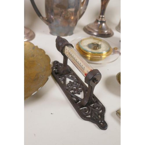 127 - A quantity of assorted metal wares including silver plated candlesticks, brass boots, silver plated ... 