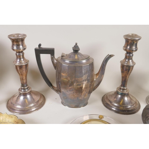 127 - A quantity of assorted metal wares including silver plated candlesticks, brass boots, silver plated ... 