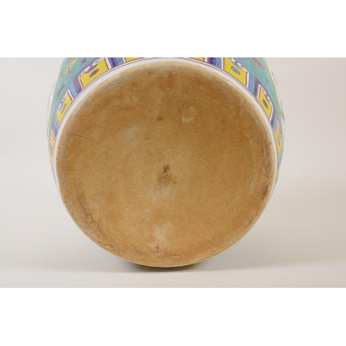 162 - A Chinese polychrome porcelain jar with decorative panels, depicting mythical creatures, 7 character... 