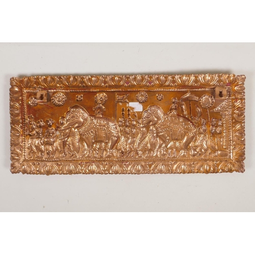 A South American style copper and white metal repousse panel depicting ...