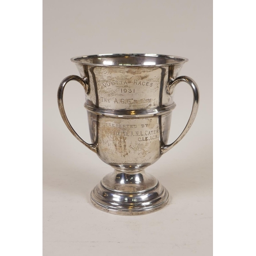 655 - An Anglo Indian silver three handled tyg cup, engraved Quetta Races 1931, The AGG's Cup, presented b...