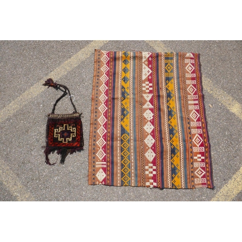 1040 - A Turkman multi colour kilim, 90 x 110cm, and belouch bag