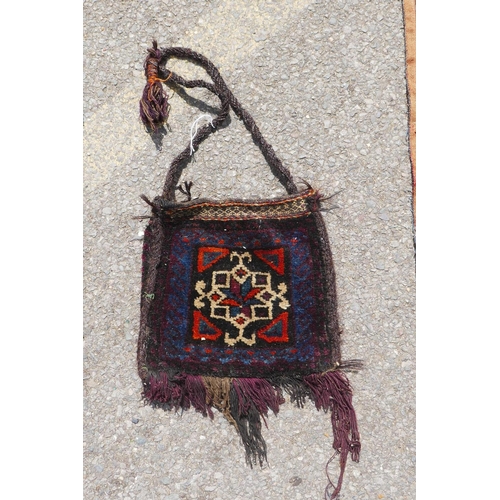 1040 - A Turkman multi colour kilim, 90 x 110cm, and belouch bag