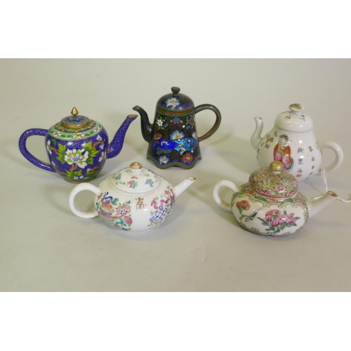 298 - A Chinese porcelain miniature teapot decorated in enamels with inscriptions, 9cm high, a famille ros...