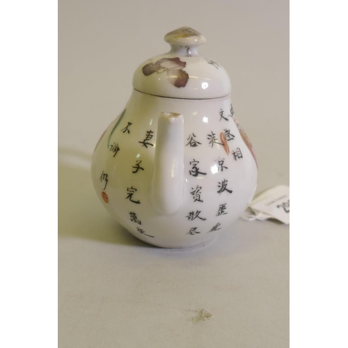 298 - A Chinese porcelain miniature teapot decorated in enamels with inscriptions, 9cm high, a famille ros... 