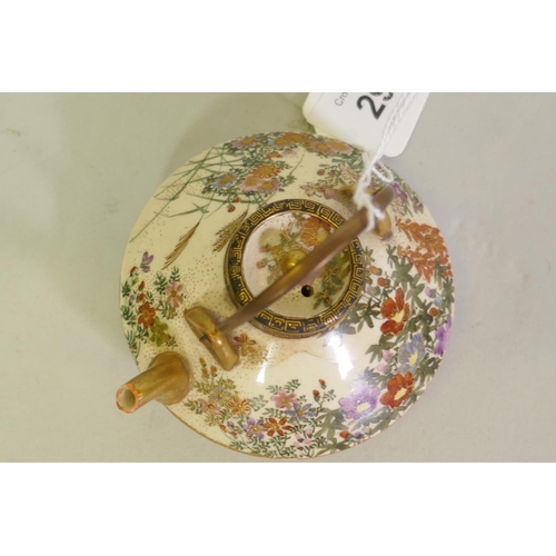 299 - Japanese Meiji Satsuma miniature teapot with finely painted floral decoration, marked to base, 8cm d... 