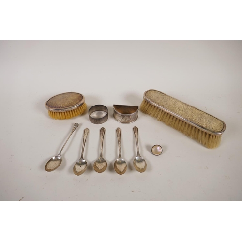 602 - A pair of silver clothes brushes with inset shagreen handles, two silver napkin rings, five silver t... 