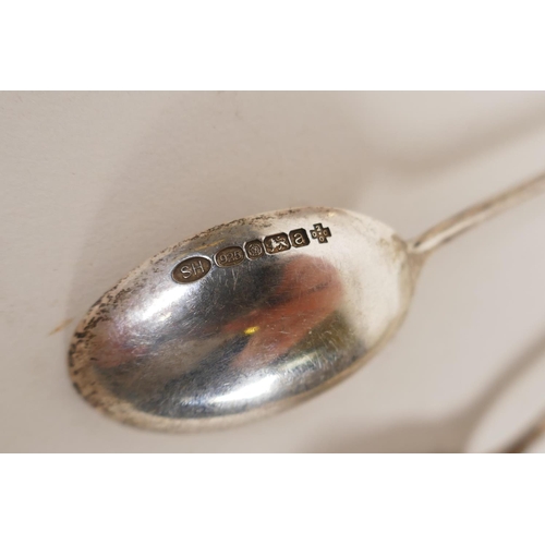 602 - A pair of silver clothes brushes with inset shagreen handles, two silver napkin rings, five silver t... 