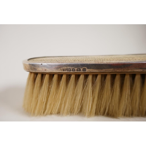 602 - A pair of silver clothes brushes with inset shagreen handles, two silver napkin rings, five silver t... 