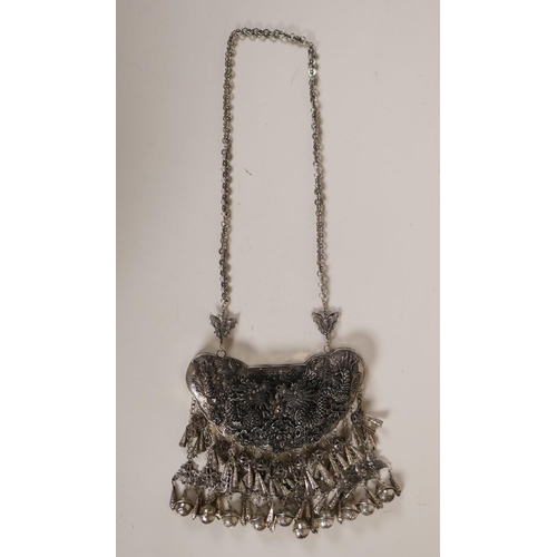 606 - A Chinese white metal 'Hmong' charm necklace with filigree decoration of dragons and flowers, 19cm w... 
