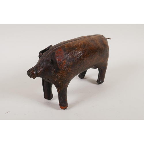 7 - A vintage Liberty style leather pig door stop in the manner of Dimitri Omersa, 24cm long