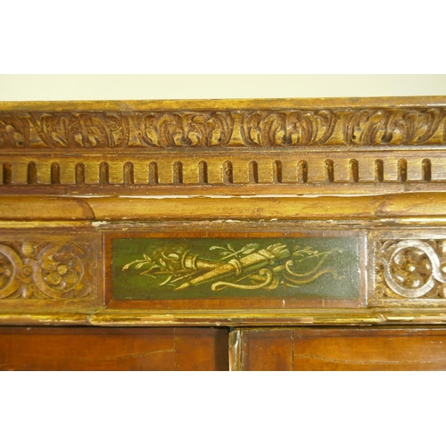 1001 - A C19th satinwood Sheraton Revival cabinet in two sections, with painted and parcel gilt decoration,... 