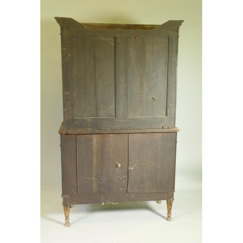 1001 - A C19th satinwood Sheraton Revival cabinet in two sections, with painted and parcel gilt decoration,... 
