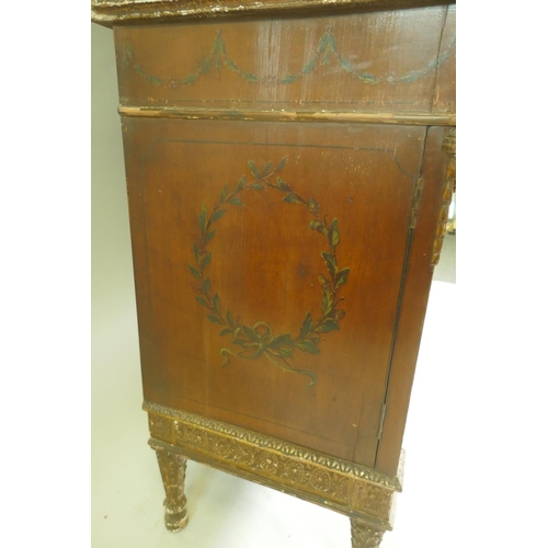 1001 - A C19th satinwood Sheraton Revival cabinet in two sections, with painted and parcel gilt decoration,... 